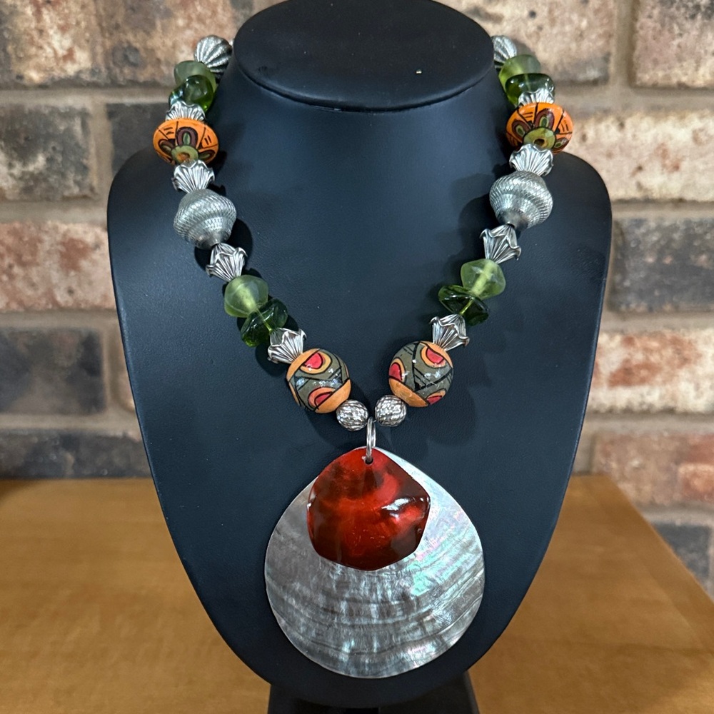 Chico’s orange and green bohemian shell pendant statement necklace